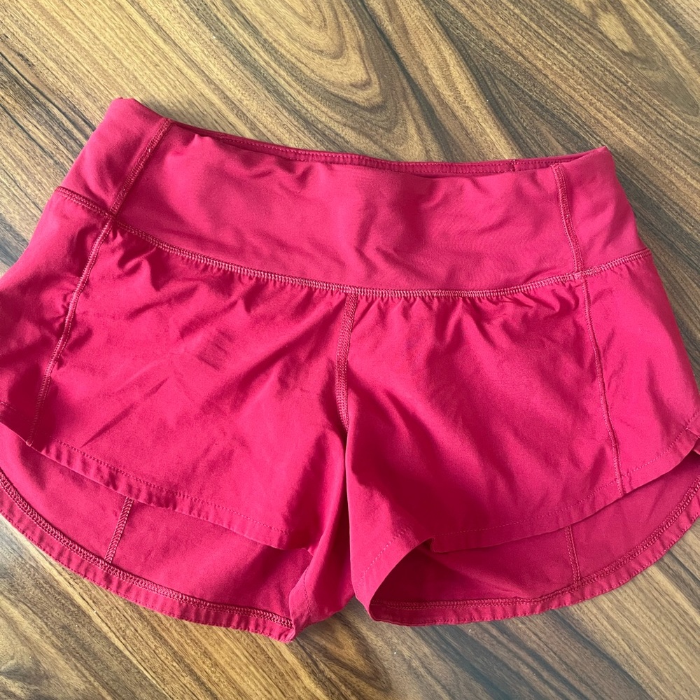 Red lululemon speed shorts, size 2